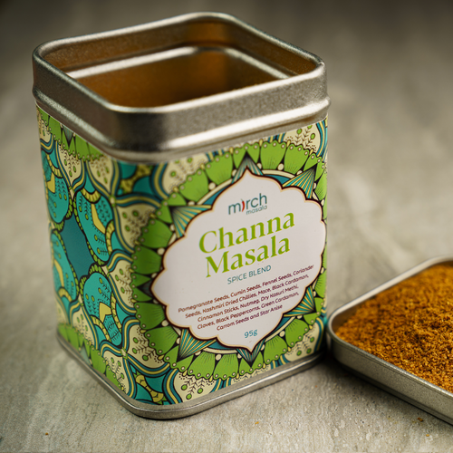 A tin of chana masala spice blend