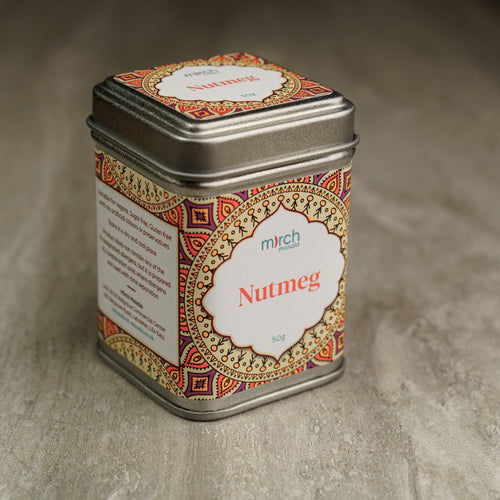 A tin of whole nutmeg spice blends